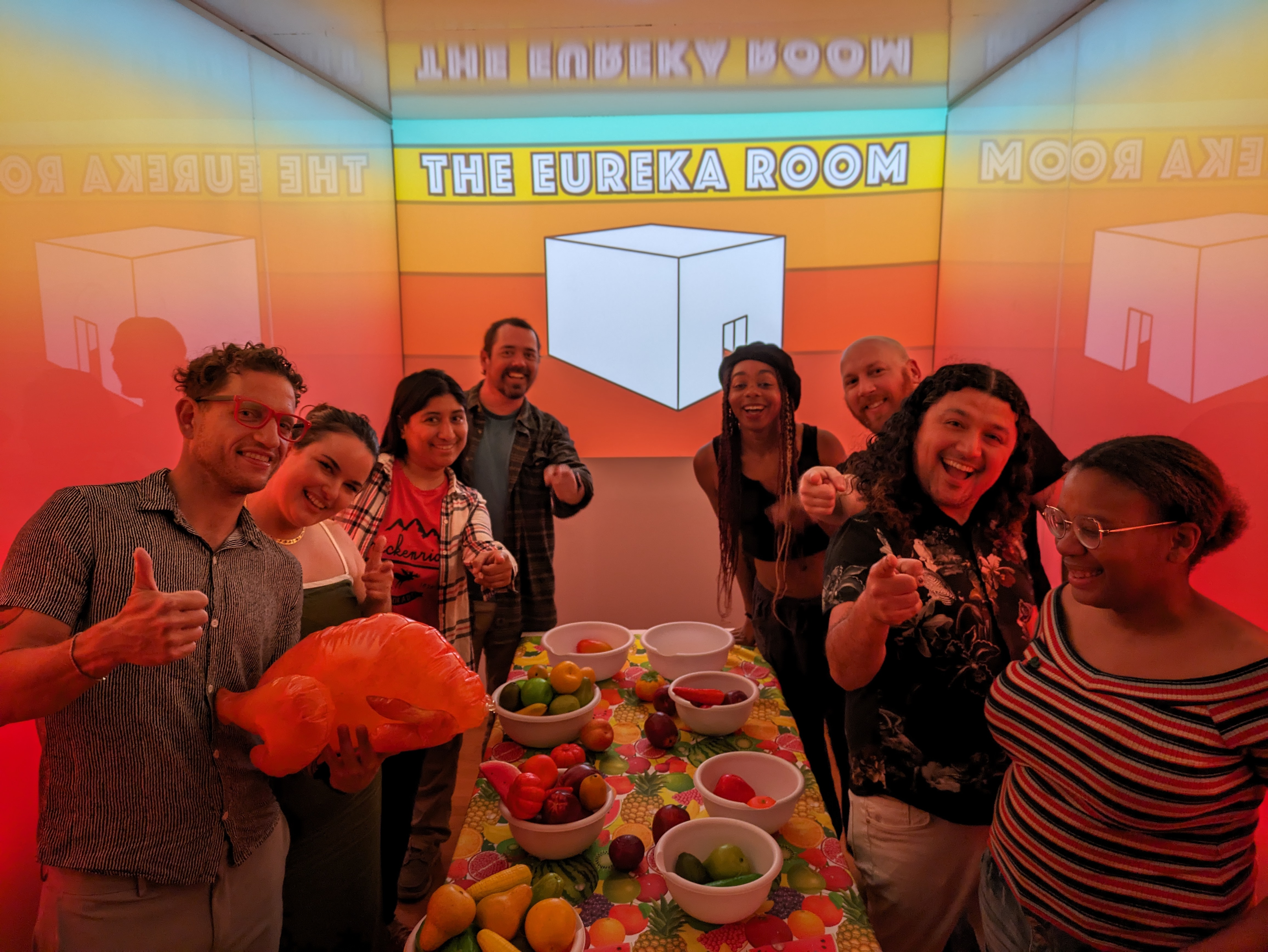 Taking photo at end with eureka room backdrop